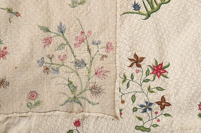 Lot 73 - The remains of a false-quilted and embroidered...