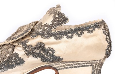 Lot 79 - A fine pair of silver lace and ivory satin...