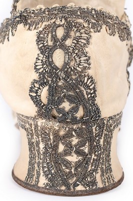 Lot 79 - A fine pair of silver lace and ivory satin...