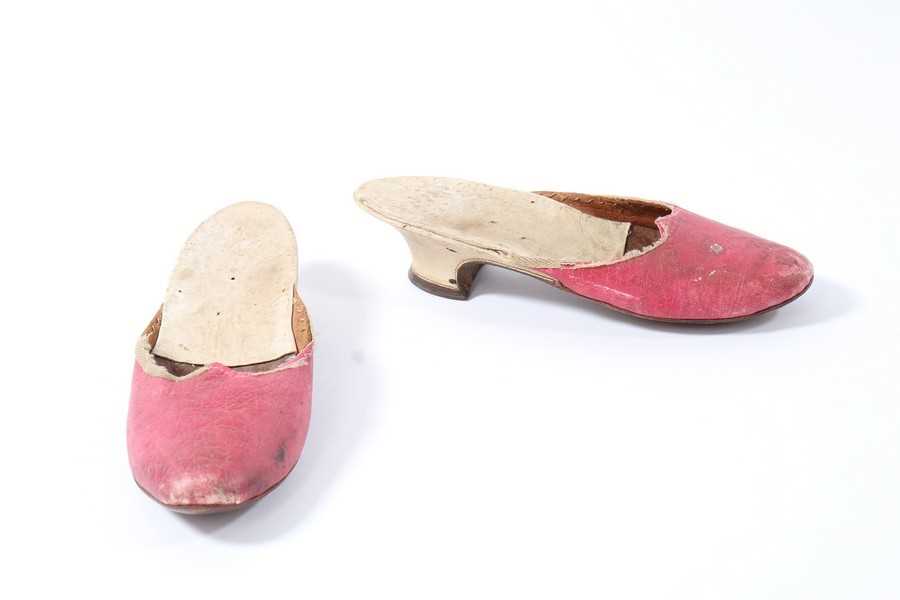 Lot 65 - A pair of pink leather ladies mules, circa...