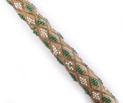 Lot 83 - A finely beaded riding crop, early 19th...