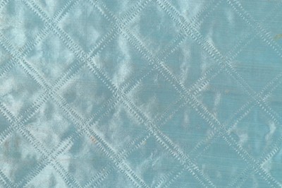 Lot 85 - A quilted blue satin petticoat, mid 18th...