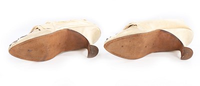 Lot 86 - A pair of embroidered satin ladies shoes,...