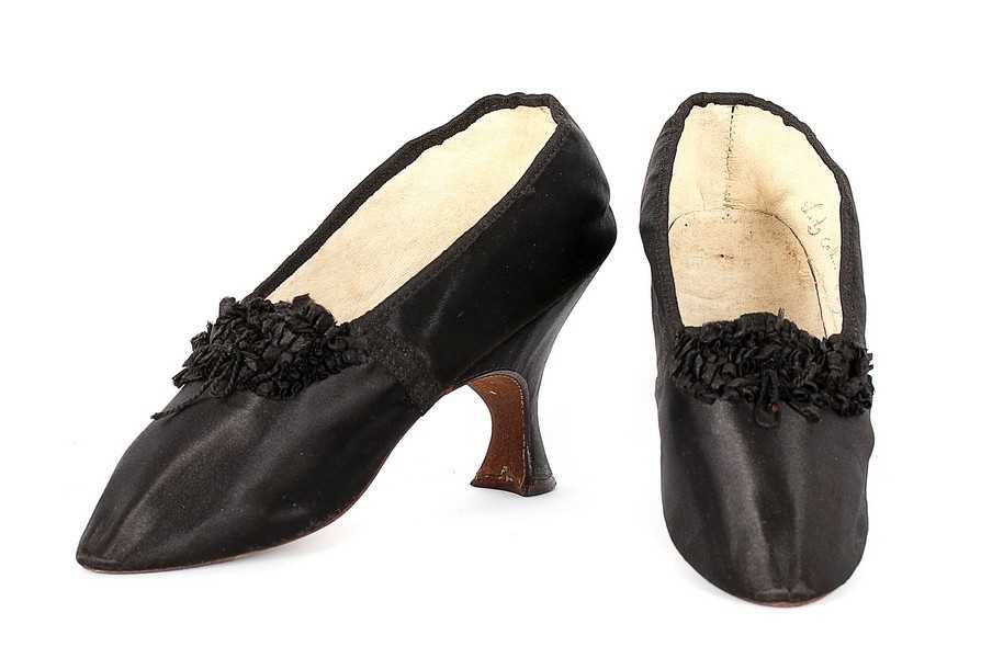Lot 66 - A pair of stylish black satin high heeled