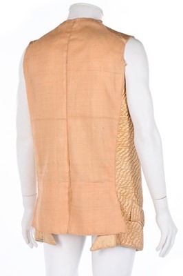 Lot 93 - Two waistcoats, one of quilted peach satin...
