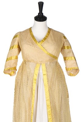 Lot 94 - An unusual cotton filet mesh open robe,...