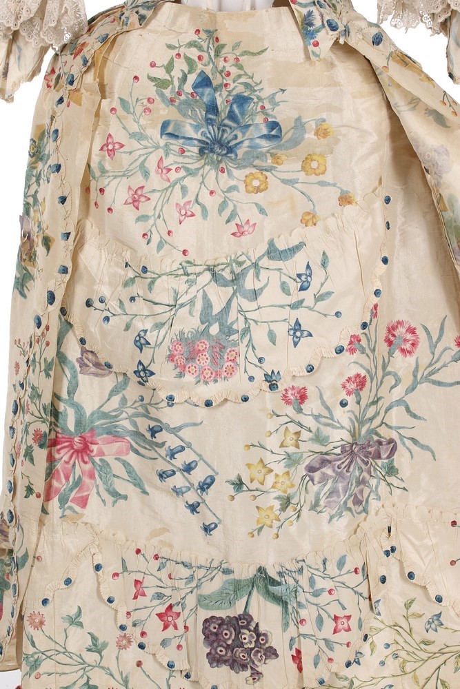 Lot 414 - A painted silk robe à la Francaise, English,