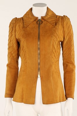 Lot 192 - An Ossie Clark mustard suede 'Rocker' jacket,...