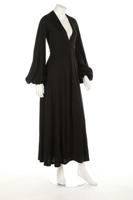 Lot 201 - An Ossie Clark black wool jersey 'Cuddly' wrap-...