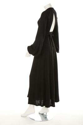 Lot 201 - An Ossie Clark black wool jersey 'Cuddly' wrap-...