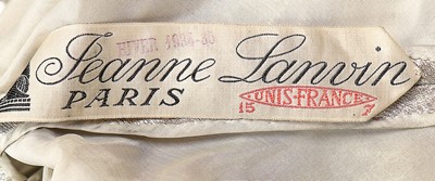 Lot 83 - A Jeanne Lanvin couture silver lamé evening...