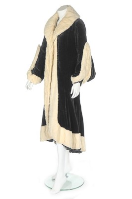 Lot 85 - An early Maggy Rouff couture black velvet and...
