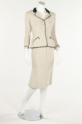 Lot 223 - A Pierre Balmain polka-dot linen suit, late...