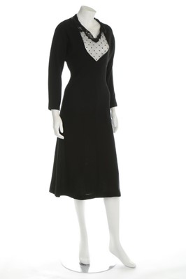 Lot 30 - An Ossie Clark black silk jersey evening gown,...