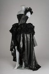 Lot 330 - A black ball gown, 1986, unlabelled, the boned,...