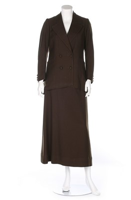 Lot 27 - A brown wool gabardine walking suit, early...