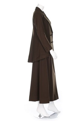 Lot 27 - A brown wool gabardine walking suit, early...