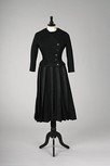 Lot 341 - An early Hubert de Givenchy black wool gown...