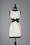 Lot 354 - An Yves Saint Laurent ivory crcocktail gown,...