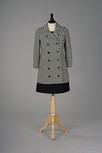 Lot 356 - An Yves Saint-Laurent navy wool mini dress...