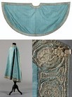 Lot 312 - A fine and rare blue watered silk cape,...