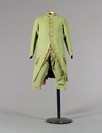 Lot 320 - A gentleman's green wool frock and silk...