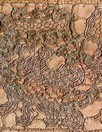 Lot 337 - A salmon pink satin and silver lace bearing...