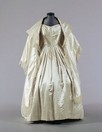 Lot 366 - 5% TI VAT PAYABLE ON THIS LOT An ivory satin...