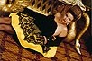 Lot 406 - A Christian Lacroix black and yellow cocktail...
