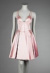 Lot 472 - A Gianni Versace pink satin, `Corsetted'...