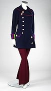 Lot 474 - A Gianni Versace navy blue two piece trouser...