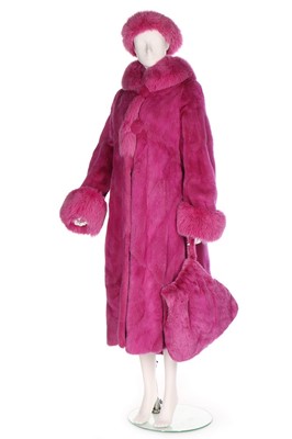 Lot 57 - A fuchsia-pink mink coat, probably 1990s, with...