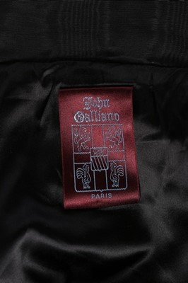 Lot 137 - A John Galliano over-sized black moiré jacket,...