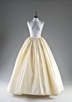 Lot 249 - An ivory taffeta over-skirt, 1981, the...