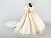 Lot 260 - A miniature copy of the royal wedding gown and...