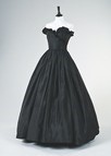 Lot 264 - The important black taffeta evening gown worn...