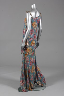 Lot 120 - A printed silver lamé bias cut evening gown,...