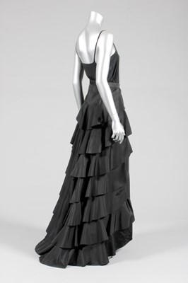 Lot 123 - A Madeleine Vionnet tiered black silk skirt...