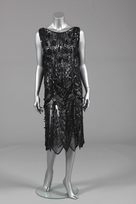 Lot 110 - A black sequinned flapper dress, mid 1920s,...