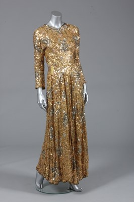Lot 130 - A gold sequined evening gown, 1950s, the...