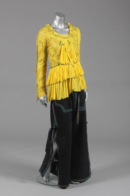 Lot 214 - A Zandra Rhodes yellow jersey top, 1972,...