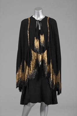 Lot 215 - A Chanel couture beaded cape, circa 1927, the...