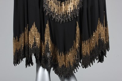 Lot 215 - A Chanel couture beaded cape, circa 1927, the...