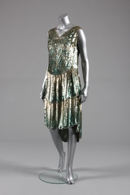 Lot 219 - A 'cobweb' sequined flapper dress, French,...