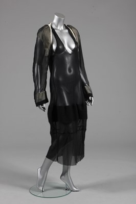 Lot 239 - A Comme des Garçons transparent black viscose...