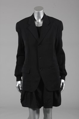 Lot 242 - A Comme des Garçons black wool 'gymslip', 1995,...