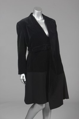 Lot 245 - A Comme des Garçons black velvet and wool coat,...