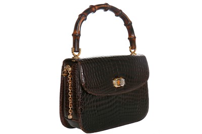 Lot 7 - A fine and rare Gucci brown crocodile handbag with bamboo handle, 1960s