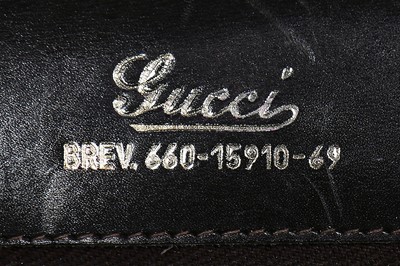 Lot 7 - A fine and rare Gucci brown crocodile handbag with bamboo handle, 1960s