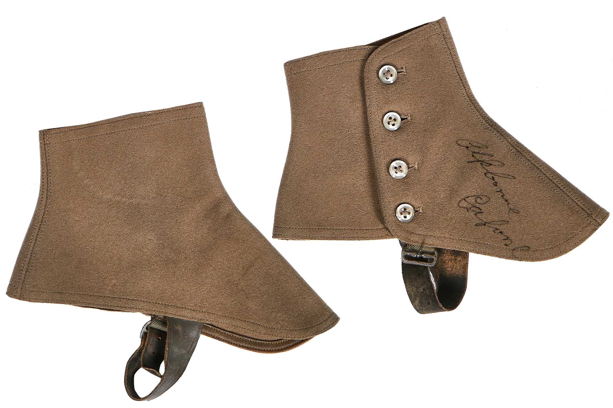 Click for high resolution Lot 46 - A rare pair of spats autographed by Al (Scarface) Capone, 1920s